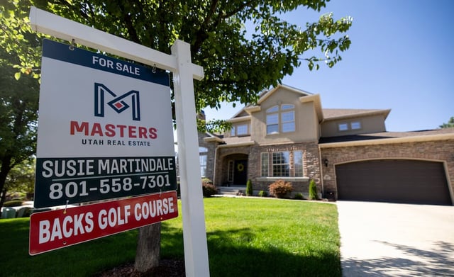 A real estate sign is posted near a home in Draper on Thursday, July 10, 2025.