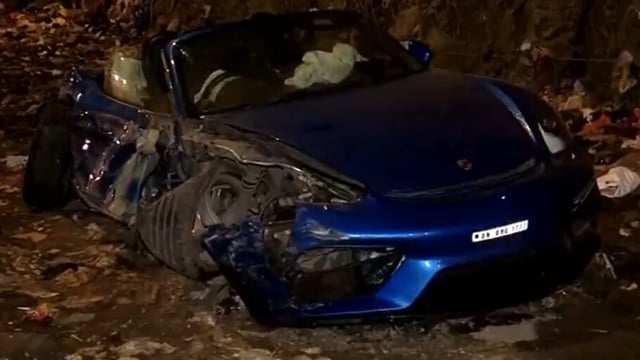 An accident occurred on the Western Express Highway in Mumbai late last night after a Porsche car allegedly collided with a divider while racing a BMW car.