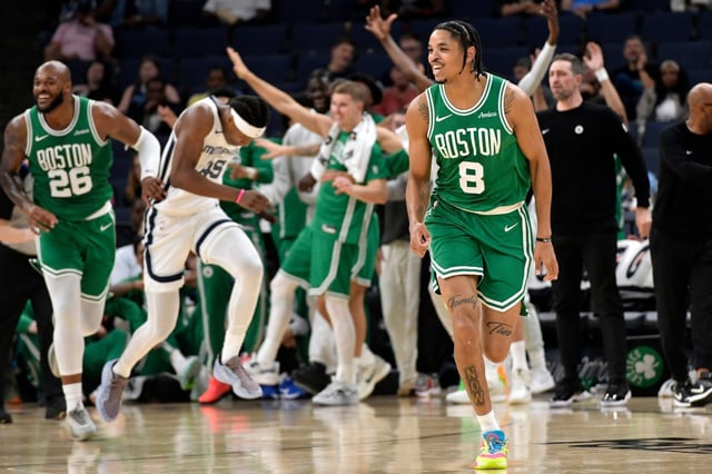 Boston Celtics forward Josh Minott (8) reacts in the first half of an NBA basketball preseason game against the Memphis Grizzlies Wednesday, Oct. 8, 2025, in Memphis, Tenn. (AP Photo/Brandon Dill)