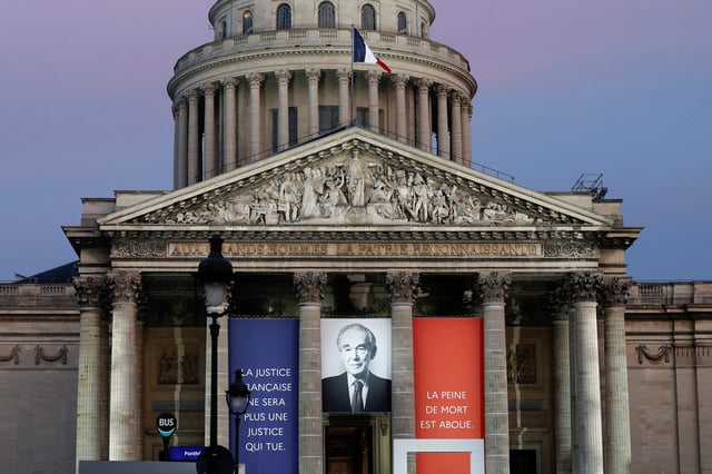 Signs and a portrait of former French Justice Minister Robert Badinter are displayed during a rehearsal of his induction ceremony into the Pantheon, on the anniversary of the promulgation of the law abolishing the death penalty, which he authored, in Paris, France, October 8, 2025. REUTERS/Benoit Tessier
