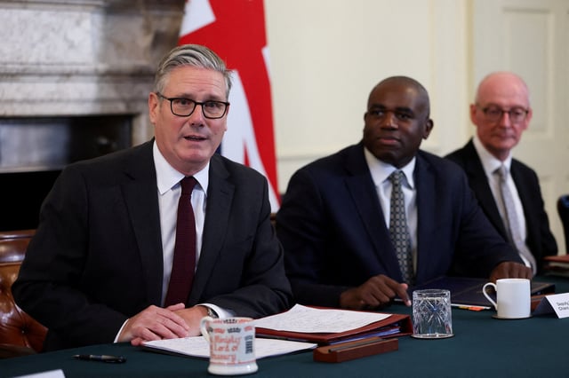 British Prime Minister Keir Starmer addresses a cabinet meeting, as Deputy Prime Minister David Lammy looks on, at 10 Downing Street, in London, Britain, September 9, 2025. REUTERS/Toby Melville/Pool