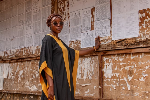 Tankeu Patie Merveille, 24, a student, poses on the campus of the University of Yaoundé I, Cameroon, Sept. 12, 2025 (AP Photo / Welba Yamo Pascal)
