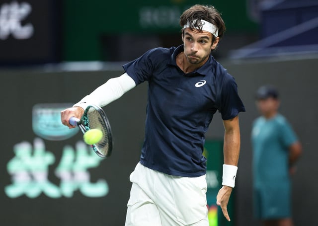 Tennis - ATP Masters 1000 - Shanghai Masters - Qizhong Forest Sports City Arena, Shanghai, China - October 8, 2025 Italy's Lorenzo Musetti in action during his round of 16 match against Canada's Felix Auger Aliassime REUTERS/Go Nakamura