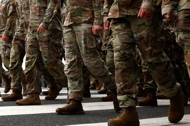 Members of the US Army participate in the 250th birthday parade on June 14, 2025 in Washington, DC. The U.S. Army is marking its 250th birthday with a military parade including roughly 6,600 troops, 150 vehicles, and over 50 aircraft. The parade, which coincides with President Donald Trump's 79th birthday, is designed to tell the history of the Army.