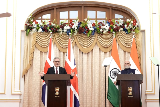 British Prime Minister Sir Keir Starmer and the Prime Minister of India, Narendra Modi, deliver a statement to the press at Raj Bhavan, in Mumbai, India October 9, 2025.    Stefan Rousseau/Pool via REUTERS