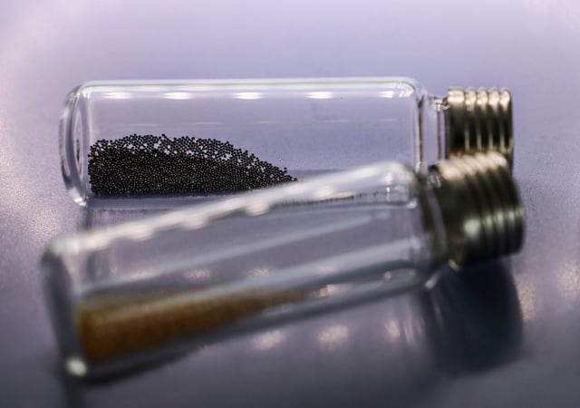 File photo: microplastics in glass tubes lie on the table in a laboratory in Rhine in 2025.