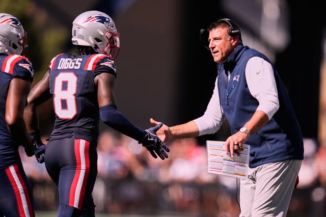 New England Patriots head coach Mike Vrabel congratulates wide receiver Stefon Diggs during an NFL game, Sunday, Sept. 28 in Foxboro. (AP Photo/Charles Krupa)