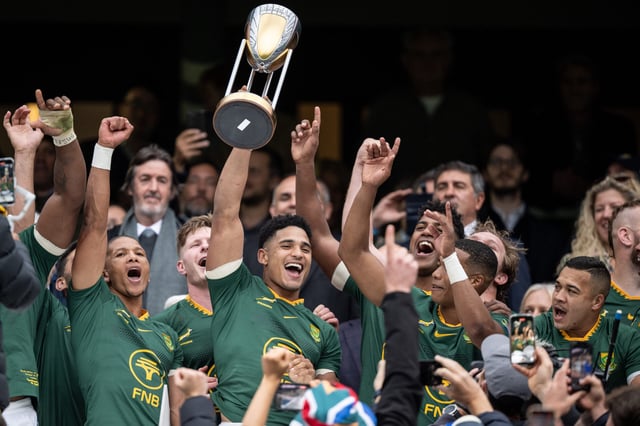 Bok flyhalf Sacha Feinberg-Mngomezulu holds the Rugby Championship trophy aloft at Twickenham after the Boks clinched the 2025 title with a 29-27 win over Argentina (Photo: Sebastian Frej/Getty Images)
