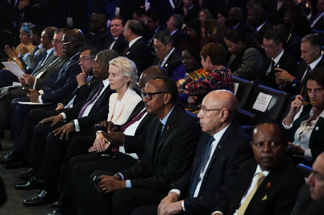 European Commission President Ursula von der Leyen, center, sits with other world leaders during the Global Gateway Forum in Brussels, Thursday, Oct. 9, 2025. (AP Photo/Virginia Mayo)