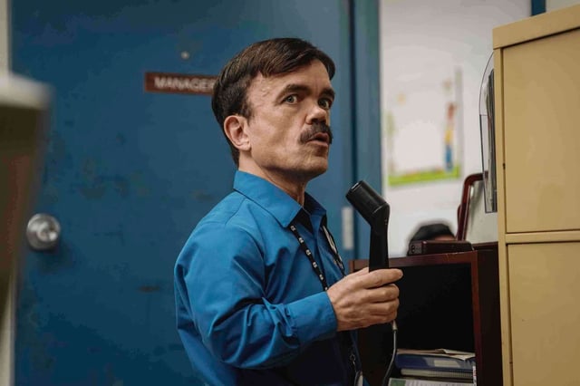 Peter Dinklage in a scene from “Roofman.”