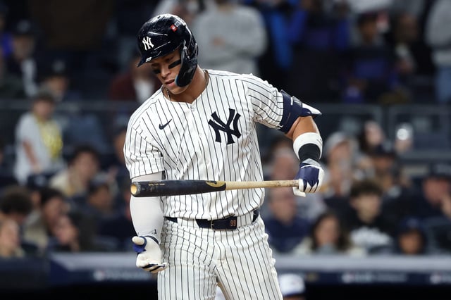 NEW YORK, NEW YORK - OCTOBER 08: Aaron Judge #99 of the New York Yankees reacts after striking out during the eighth inning against the Toronto Blue Jays in game four of the American League Division Series at Yankee Stadium on October 08, 2025 in New York City.  (Photo by Al Bello/Getty Images)
