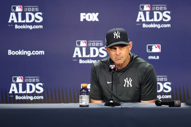 NEW YORK, NEW YORK - OCTOBER 08: Manager Aaron Boone #17 of the New York Yankees speaks to the media before game four of the American League Division Series against the Toronto Blue Jays at Yankee Stadium on October 08, 2025 in New York City.  (Photo by Ishika Samant/Getty Images)