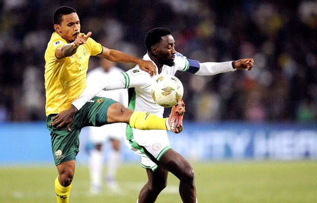 Bafana Bafana's Oswin Reagan Appollis and Onyinye Wilfred Ndidi of Nigeria during their 2026 Fifa World Cup qualifier at Toyota Stadium on 9 September 2025 in Bloemfontein, South Africa. (Photo: Charlé Lombard / Gallo Images / Getty Images)