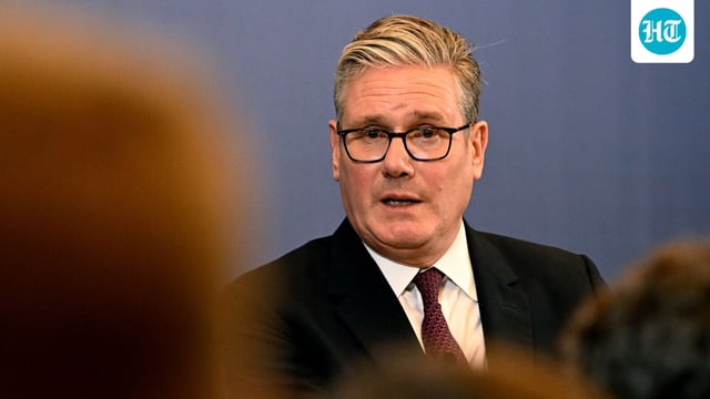 Britain's Prime Minister Keir Starmer speaks at a press conference in Mumbai on October 9, 2025. (Photo by Leon Neal / POOL / AFP)