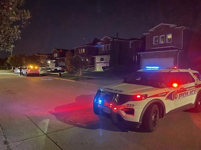 York Regional Police investigate a homicide near Lorraine Street and Bernard Avenue in Richmond Hill, Ont., on Oct. 8, 2025.