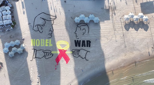 An aerial view of drawings staged by activists calling for an end to the war in Gaza near the U.S. Embassy in Tel Aviv, Sept. 12, 2025. (Stringer/Anadolu via Getty Images)