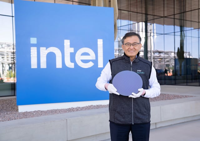Intel CEO Lip-Bu Tan holds a wafer of CPU tiles for the Intel Core Ultra series 3, code-named Panther Lake, at the Intel Ocotillo campus in Chandler, Arizona. Panther Lake is the first client system-on-chips (SoC) built on the Intel 18A process node. (Credit: Intel Corporation)