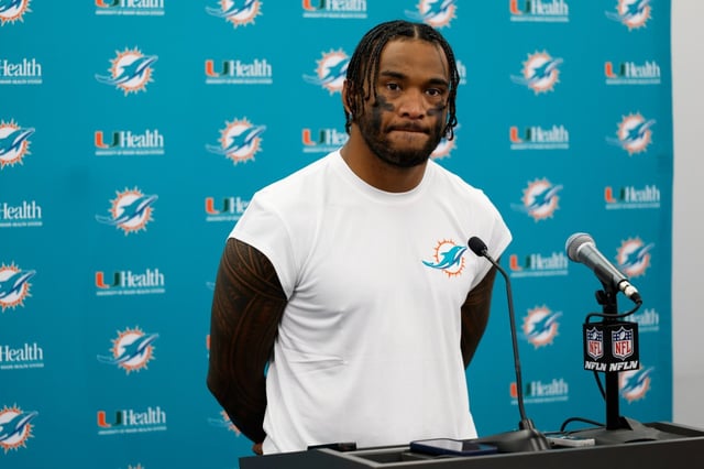 Miami Dolphins quarterback Tua Tagovailoa speaks during a news conference after an NFL football game against the Carolina Panthers, Sunday, Oct. 5, 2025, in Charlotte, N.C. (AP Photo/Rusty Jones)