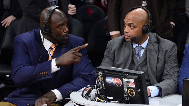 Feb 16, 2013; Houston, TX, USA; TNT broadcaster Shaquille O'Neal (left) and Charles Barkley talk during the 2013 NBA All-Star slam dunk contest at the Toyota Center. Mandatory Credit: Bob Donnan-USA TODAY Sports