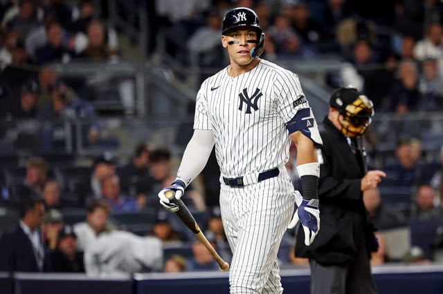 Oct 8, 2025; Bronx, New York, USA; New York Yankees right fielder Aaron Judge (99) reacts to striking during the eighth inning against the Toronto Blue Jays during game four of the ALDS round for the 2025 MLB playoffs at Yankee Stadium. Mandatory Credit: Brad Penner-Imagn Images