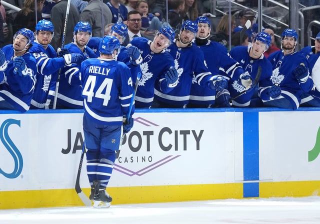 Toronto Maple Leafs defenceman Morgan Rielly celebrates at the bench after scoring a goal (Nick Turchiaro-Imagn Images)
