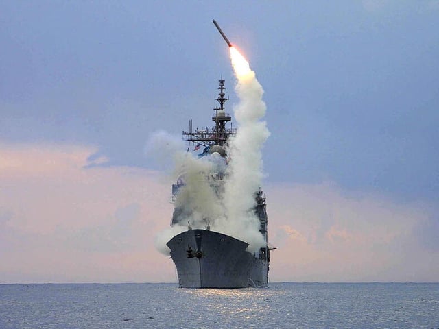 EASTERN MEDITERRANEAN SEA - MARCH 23:  A Tomahawk Land Attack Missile is launched on Iraq from the guided missile cruiser USS Cape St. George March 23, 2003 in the eastern Mediterranean Sea. The Cape St. George is operating in support of Operation Iraqi Freedom as part of the U.S. and British coalition forces' attack on Iraq.  (Photo by Kenneth Moll/U.S. Navy/Getty Images)