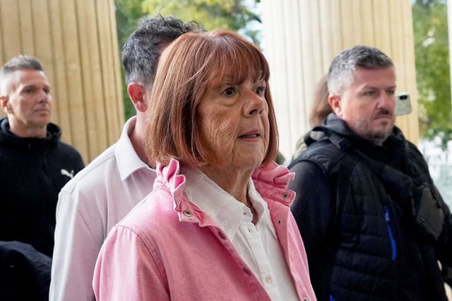 Gisele Pelicot arrives at the courthouse for the appeals trial in the case of a man challenging his conviction, less than a year after the landmark verdict in a drugging and rape trial that shook France Thursday, Oct. 9, 2025 in Nimes, southern France. (AP Photo/Lewis Joly)