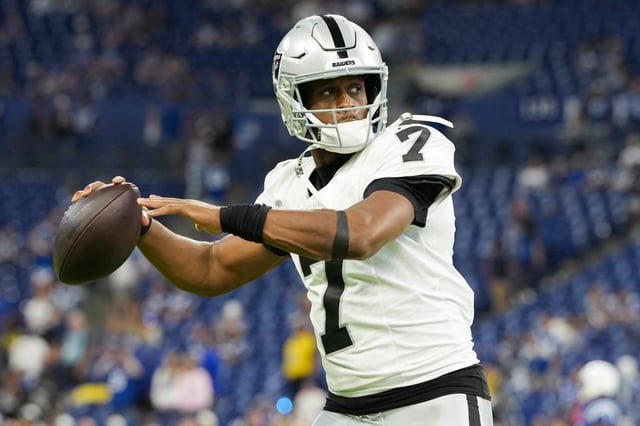 Geno Smith #7 of the Las Vegas Raiders warms up prior to an NFL football game against the Indianapolis Colts at Lucas Oil Stadium on October 5, 2025 in Indianapolis, Indiana.