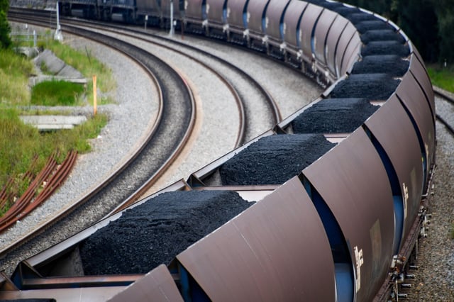 Coal being transported by rail, Australia. Credit: John Martin - Fotografo / Alamy Stock Photo