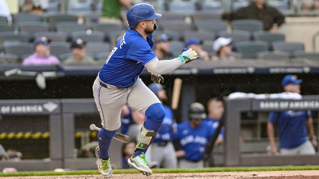 Sep 6, 2025; Bronx, New York, USA; Toronto Blue Jays shortstop Bo Bichette (11) hits a double against the New York Yankees during the fifth inning at Yankee Stadium. Mandatory Credit: John Jones-Imagn Images