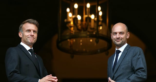 French Minister of Foreign Affairs Jean-Noel Barrot, right, welcomes French President Emmanuel Macron for talks with European and Arab leaders at the foreign ministry in Paris. AP