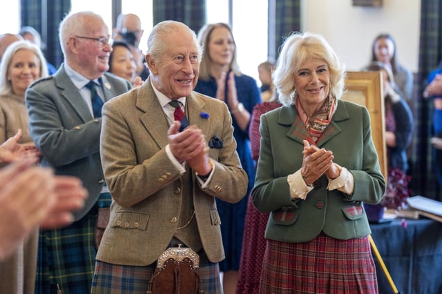 Britain's King Charles and Queen Camilla applaud during a visit to mark the 150th anniversary of the Albert Hall in Ballater, Scotland, Britain, October 9, 2025.   Jane Barlow/Pool via REUTERS