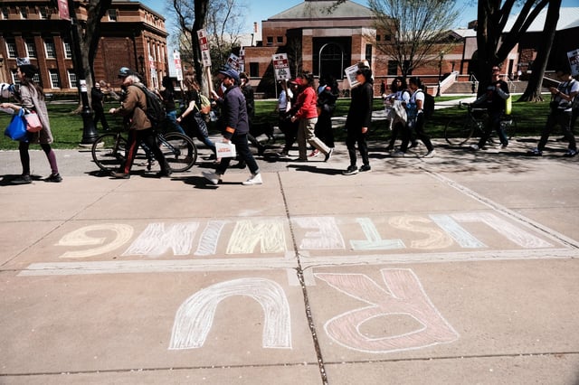 Rutgers students and faculty participate in a strike at the university's main campus on April 10, 2023, in New Brunswick, New Jersey.