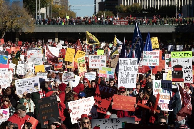 Thousands take part in a rally in support of teachers and public education outside the Alberta legislature in Edmonton on Sunday, Oct. 5, 2025. 
