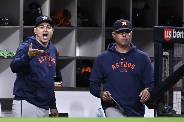 Sep 16, 2024; San Diego, California, USA; Houston Astros hitting coach Alex Cintron (L) reacts after being ejected during the sixth inning against the San Diego Padres at Petco Park. Mandatory Credit: Orlando Ramirez-Imagn Images/ File Photo