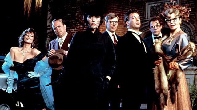CLUE, Lesley Ann Warren, Martin Mull, Madeline Kahn, Michael McKean, Tim Curry, Christopher Lloyd, Eileen Brennan, 1985. (Courtesy of Everett Collection)