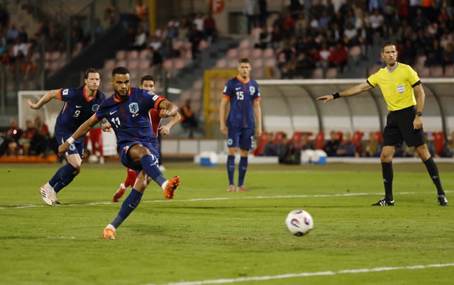 Soccer Football - FIFA World Cup - UEFA Qualifiers - Group G - Malta v Netherlands - National Stadium Ta' Qali, Attard, Malta - October 9, 2025 Netherlands' Cody Gakpo scores their second goal from the penalty spot REUTERS/Darrin Zammit Lupi