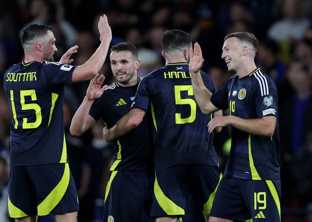 Soccer Football - FIFA World Cup - UEFA Qualifiers - Group C - Scotland v Greece - Hampden Park, Glasgow, Scotland, Britain - October 9, 2025 Scotland's John McGinn celebrates with teammates after the match REUTERS/Russell Cheyne