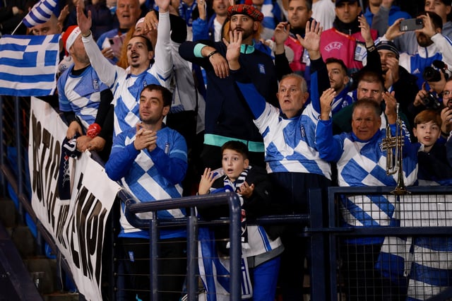 Soccer Football - FIFA World Cup - UEFA Qualifiers - Group C - Scotland v Greece - Hampden Park, Glasgow, Scotland, Britain - October 9, 2025 Greece fans react Action Images via Reuters/Lee Smith