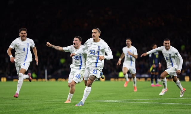 Soccer Football - FIFA World Cup - UEFA Qualifiers - Group C - Scotland v Greece - Hampden Park, Glasgow, Scotland, Britain - October 9, 2025 Greece's Kostas Tsimikas celebrates scoring their first goal REUTERS/Russell Cheyne