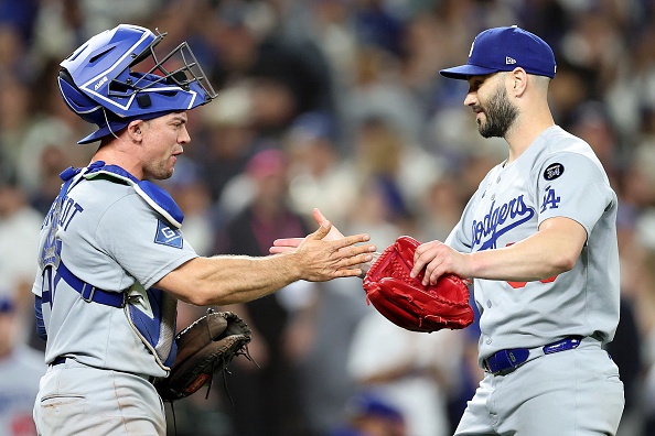 SEATTLE, WASHINGTON – SEPTEMBER 26: Ben Rortvedt #47 and Tanner Scott #66 of the Los Angeles Dodgers celebrate after beating the Seattle Mariners at T-Mobile Park on September 26, 2025 in Seattle, Washington. (Photo by Steph Chambers/Getty Images)