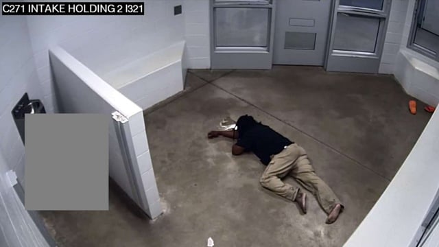 Dakota County Jail surveillance footage shows Kingsley Bimpong on the floor of his jail cell while suffering from a stroke on Nov. 17, 2024. (U.S. District Court)