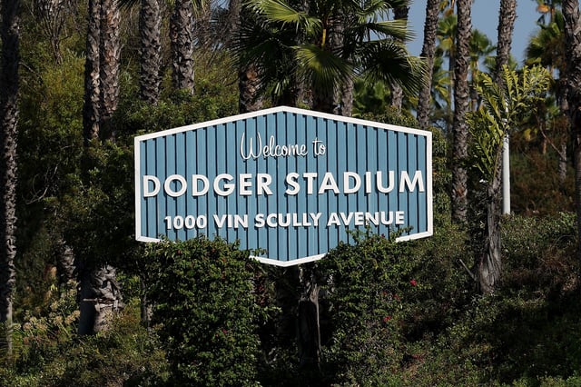 A general view of Dodger Stadium signage near Sunset Gate A before game one of the National League Wild Card Series between the Los Angeles Dodgers and the Cincinnati Reds at Dodger Stadium on September 30, 2025 in Los Angeles, California.