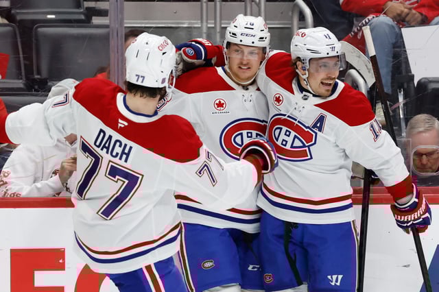 Oct 9, 2025; Detroit, Michigan, USA; Montral Canadiens right wing Zack Bolduc (76) receives congratulations from teammates after scoring in the first period against the Detroit Red Wings at Little Caesars Arena. Mandatory Credit: Rick Osentoski-Imagn Images
