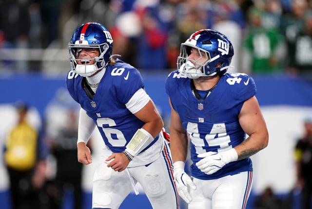 EAST RUTHERFORD, NEW JERSEY - OCTOBER 09: Jaxson Dart #6 and Cam Skattebo #44 of the New York Giants celebrate after Skattebo carried the ball into the endzone for a touchdown during the second quarter of the game against the Philadelphia Eagles at MetLife Stadium on October 09, 2025 in East Rutherford, New Jersey. (Photo by Al Bello/Getty Images)