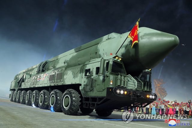 This file photo, released by North Korea's official Korean Central News Agency, shows a Hwasong-18 solid-fuel intercontinental ballistic missile (ICBM) on display during a military parade, attended by North Korean leader Kim Jong-un, at Kim Il-sung Square in Pyongyang on the night of July 27, 2023, to mark the 70th anniversary of the signing of the armistice that halted the 1950-53 Korean War. (For Use Only in the Republic of Korea. No Redistribution) (Yonhap)