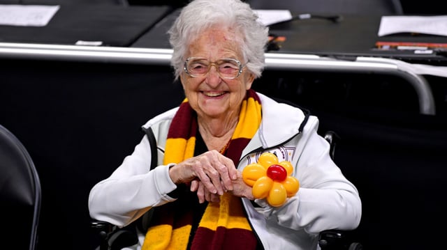 Former Loyola-Chicago team chaplain Sister Jean, shown here before the Ramblers' game against the Michigan Wolverines in the 2018 Final Four, has died.