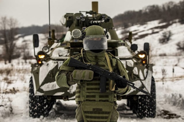 A Russia army's military engineer in an explosive suit. Russia has deployed at least 100,000 troops along Ukraine border amid mounting tension in the Eastern Europe. (Photo by EyePress News / EyePress via AFP)