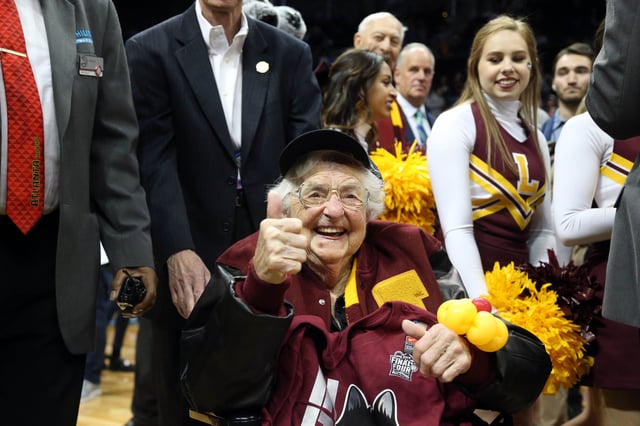 Mar 24, 2018; Atlanta, GA, USA; Loyola Ramblers team chaplain Sister Jean Dolores-Schmidt celebrates after defeating Kansas State Wildcats in the championship game of the South regional of the 2018 NCAA Tournament at Philips Arena. Mandatory Credit: Brett Davis-USA TODAY Sports