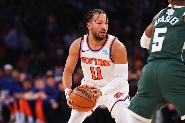 NEW YORK, NEW YORK - DECEMBER 25: Jalen Brunson #11 of the New York Knicks controls the ball during the second quarter against the Milwaukee Bucks at Madison Square Garden on December 25, 2023 in New York City.